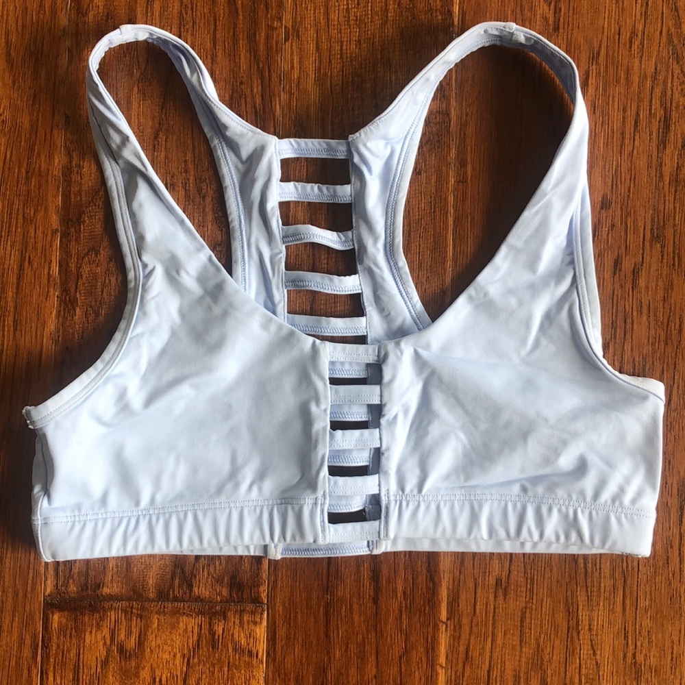 Light Blue VS Pink sports bra